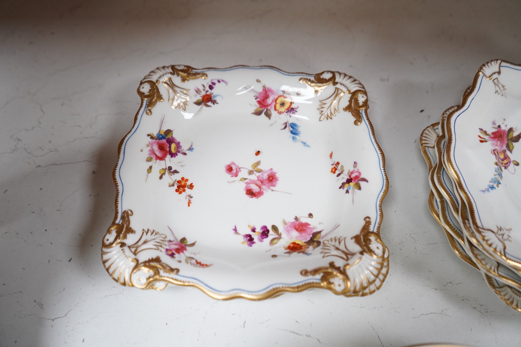 A set of six early 19th century Spode floral dessert plates, and an English porcelain part dessert service, c.1835, largest 22cm in diameter